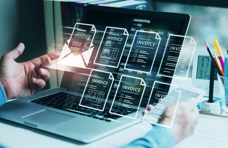 digital invoices and a hand touching one
